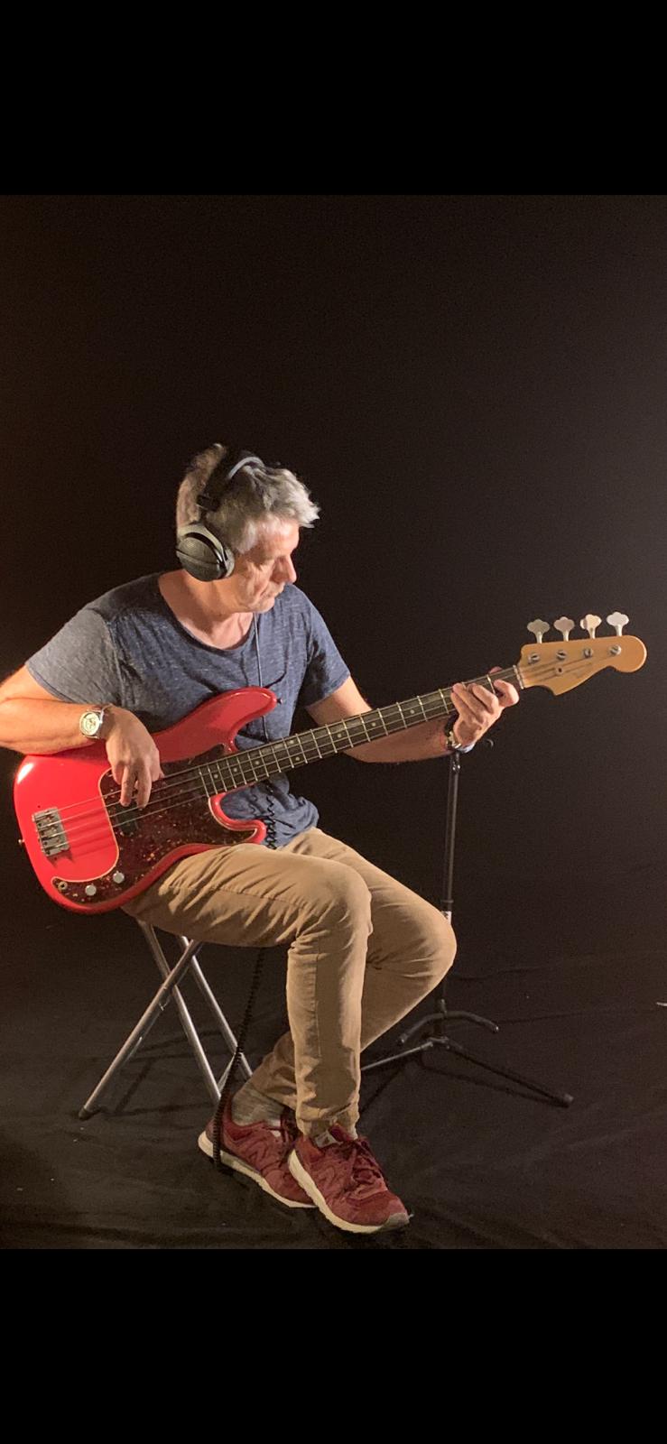 Young Daniel Yvinec playing bass