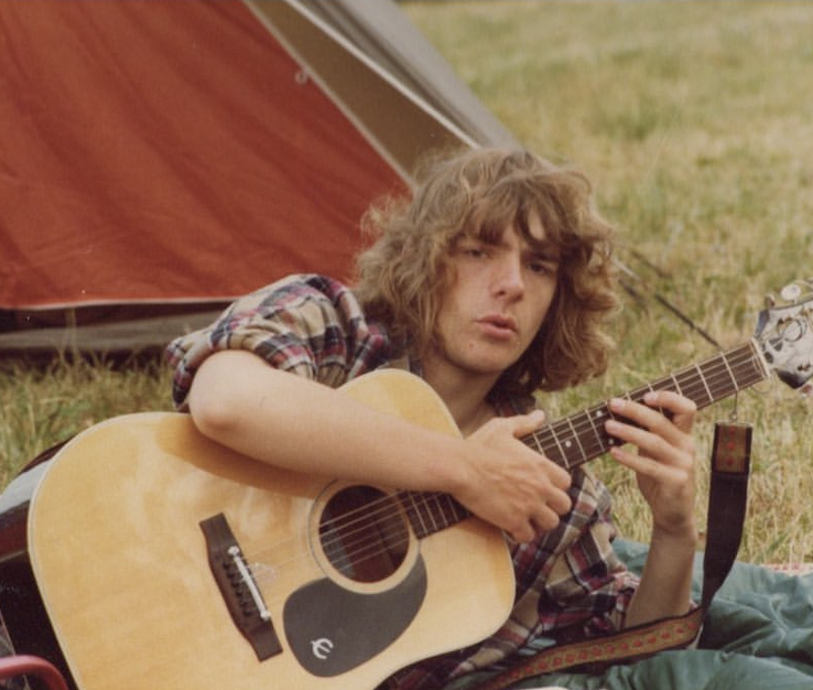 Young Daniel Yvinec with guitar